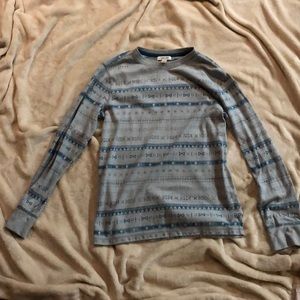 blue grey long sleeved shirt